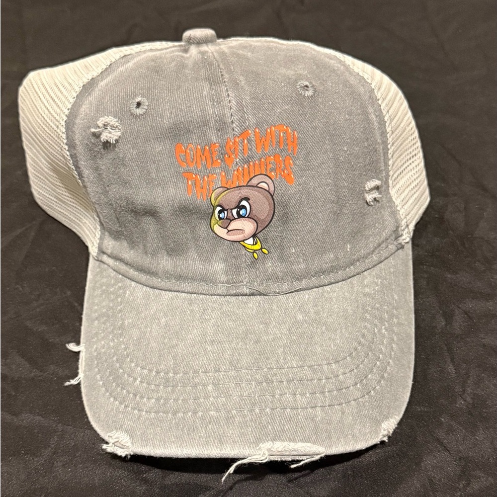 Gray Distressed Cap with a stylish bear with orange logo graphic design.